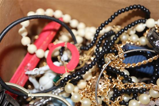 A box of assorted costume jewellery.